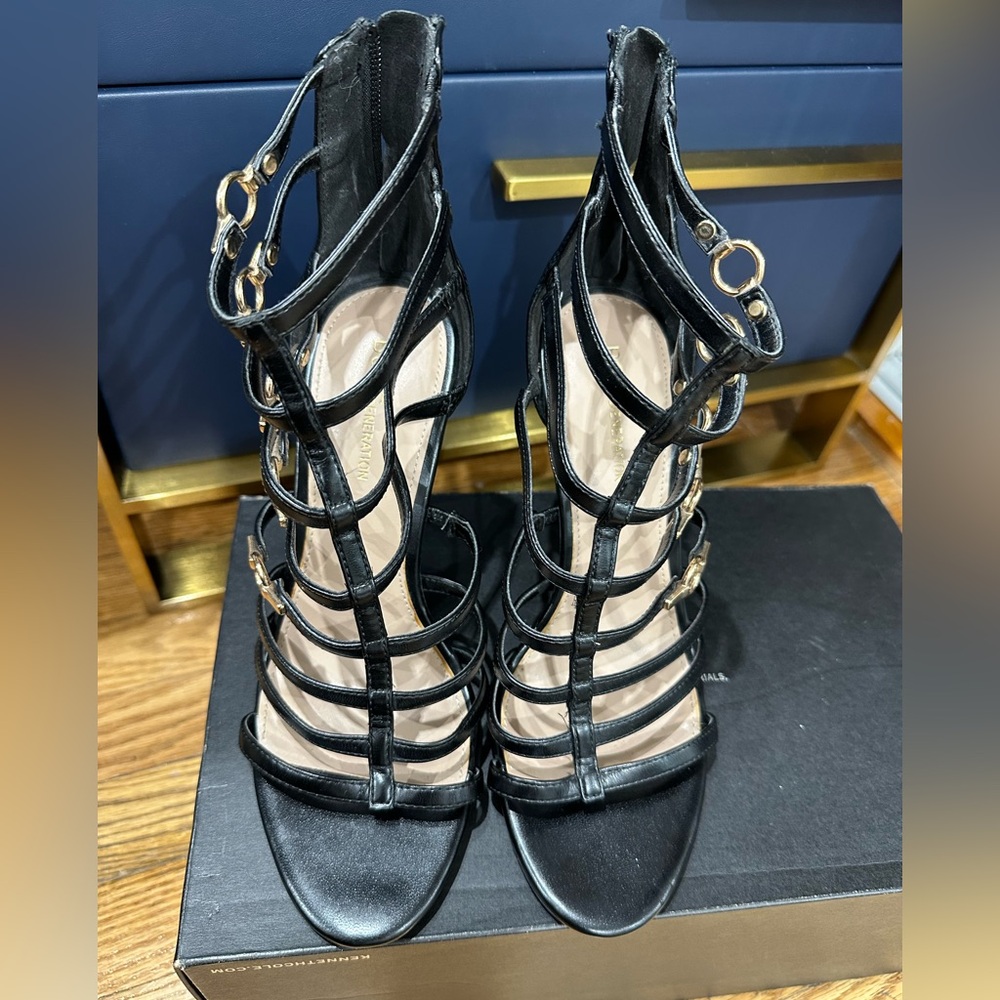 BCBGeneration Black Strappy Heels with Gold Accents
